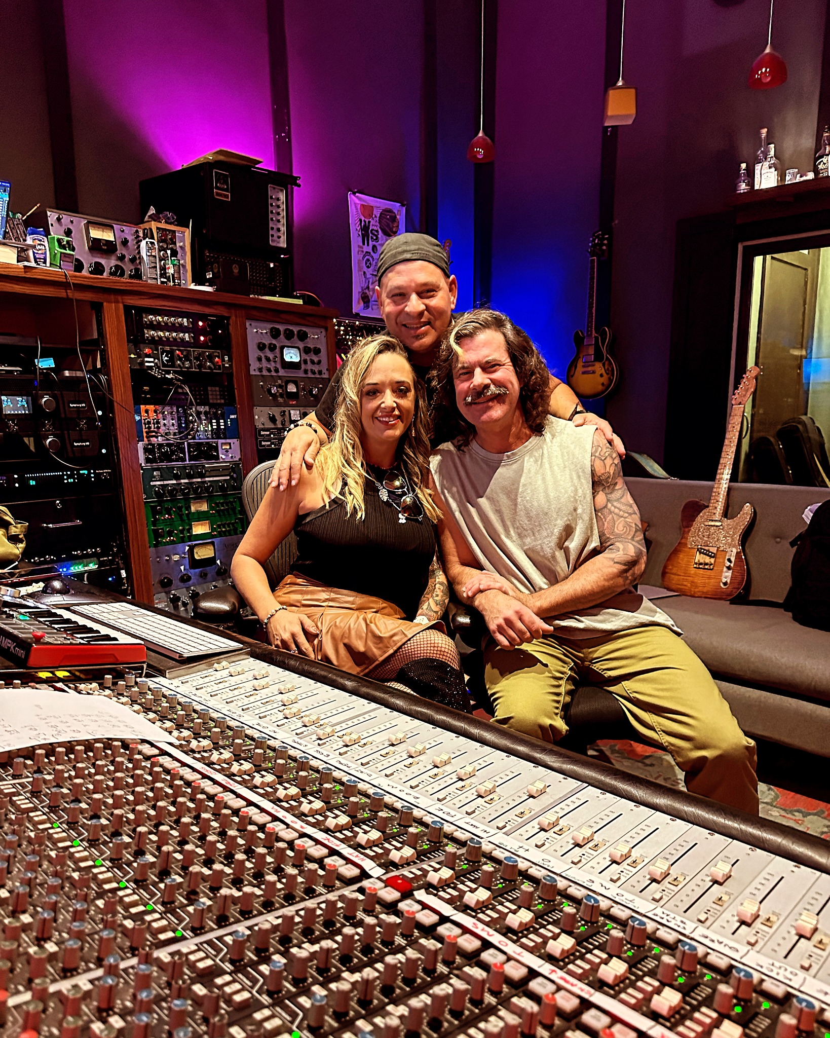 Ashley and collaborators at the recording console